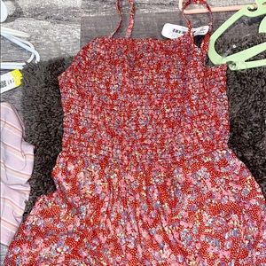 Red romper size small brand new with tag